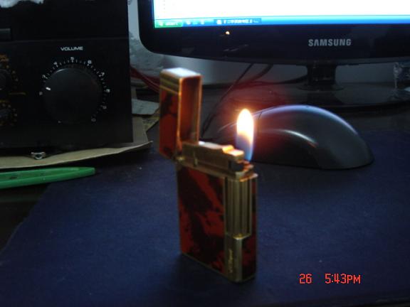 卖台督彭打火机和台摩托车