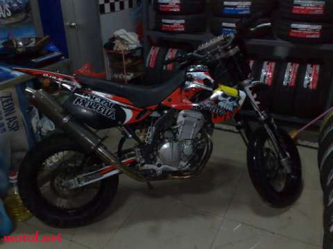 03KLX250